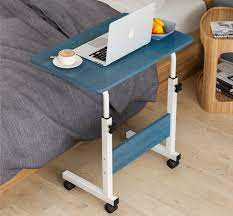 Adjustable and moveable table
